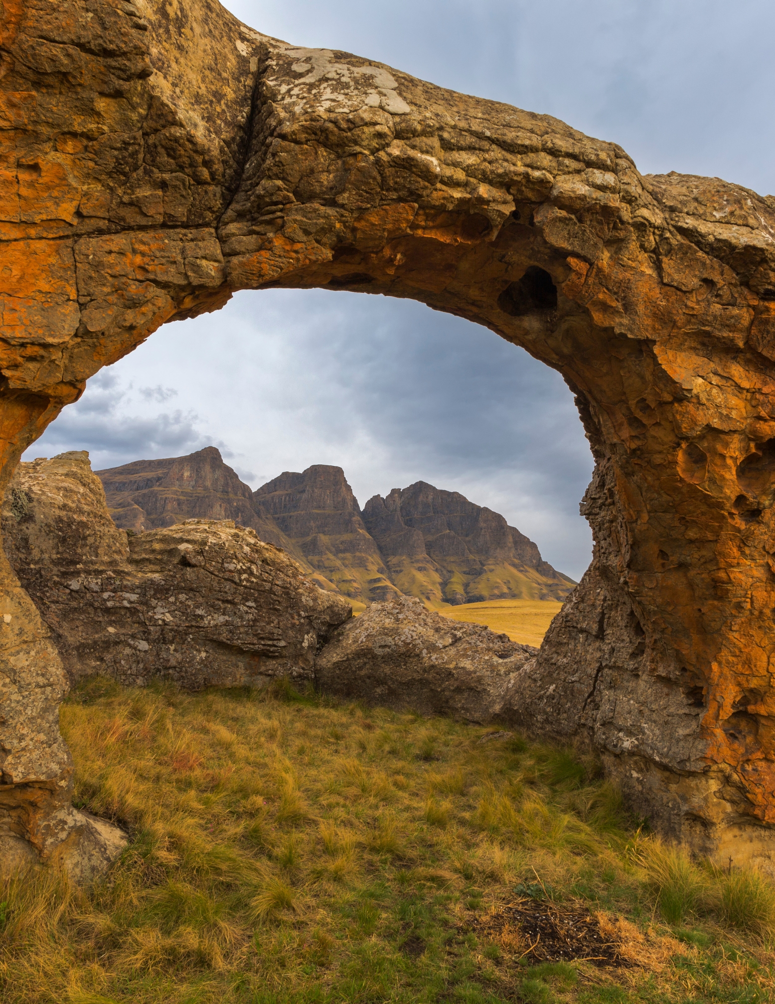 Rock arch framing the mountains